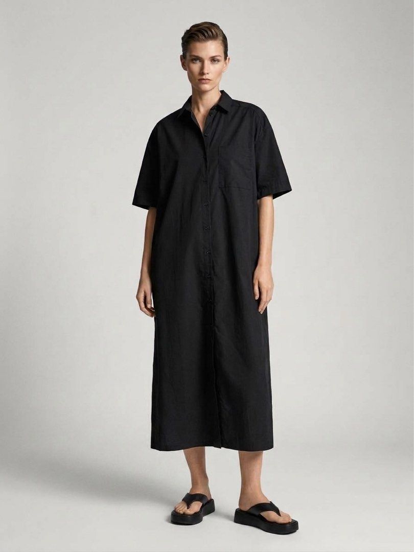 Zara Black Long Dress (Category: Dresses) located in Manila. Submitted by morningthrifters (Listing ID 1470945798, Image 1). Description: 📝 This item is an oversized black short-sleeve shirt dress from the Zara Women’s Collection. It features a relaxed silhouette, classic point collar, full button-down front, and a single patch pocket on the chest. 📍Pateros Metro Manila 🚚 Jnt / Lalamove / Pickup 📐 Size Large on tag 💗 Second time buyers has a