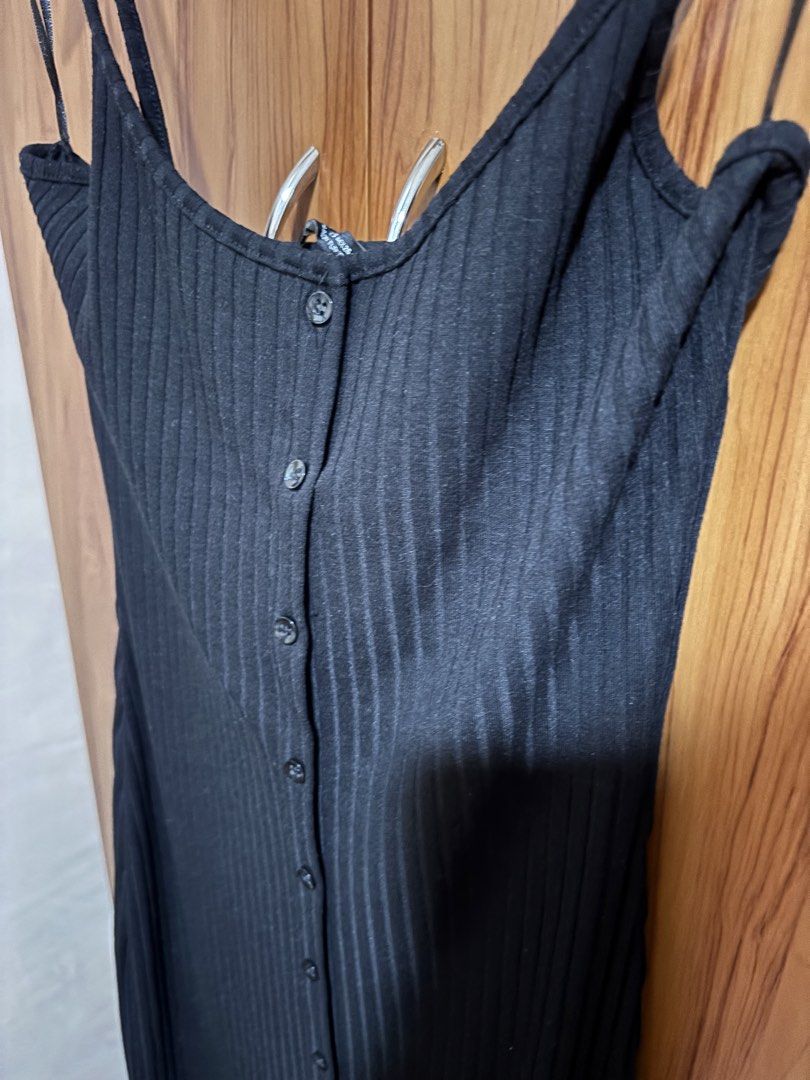 Zara Black Ribbed Button-Down Midi Dress Size S (Category: Dresses) located in Manila. Submitted by wardrobeinmnl (Listing ID 1471022201, Image 3). Description: - Brand: Zara - Size: S (Made in Turkey) - Color: Black - Style: Midi dress with spaghetti straps and scoop neckline - Details: Full button-front closure, vertical ribbing texture, form-fitting silhouette - Condition: Great basic piece, easy to dress up or down.