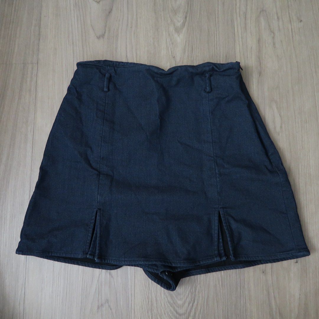 Zara Dark Blue Denim Skort Size S (Category: Skirts) located in Manila. Submitted by mixi_lexi (Listing ID 1471038315, Image 1). Description: - Brand: Zara - Color: Dark blue denim - Size: EUR S, USA S, MEX 26 - Made in Turkey - Design: High waist, skirt look outside with built-in shorts for comfort, and chic front slits - Condition: Excellent pre-loved condition (ready to wear!).