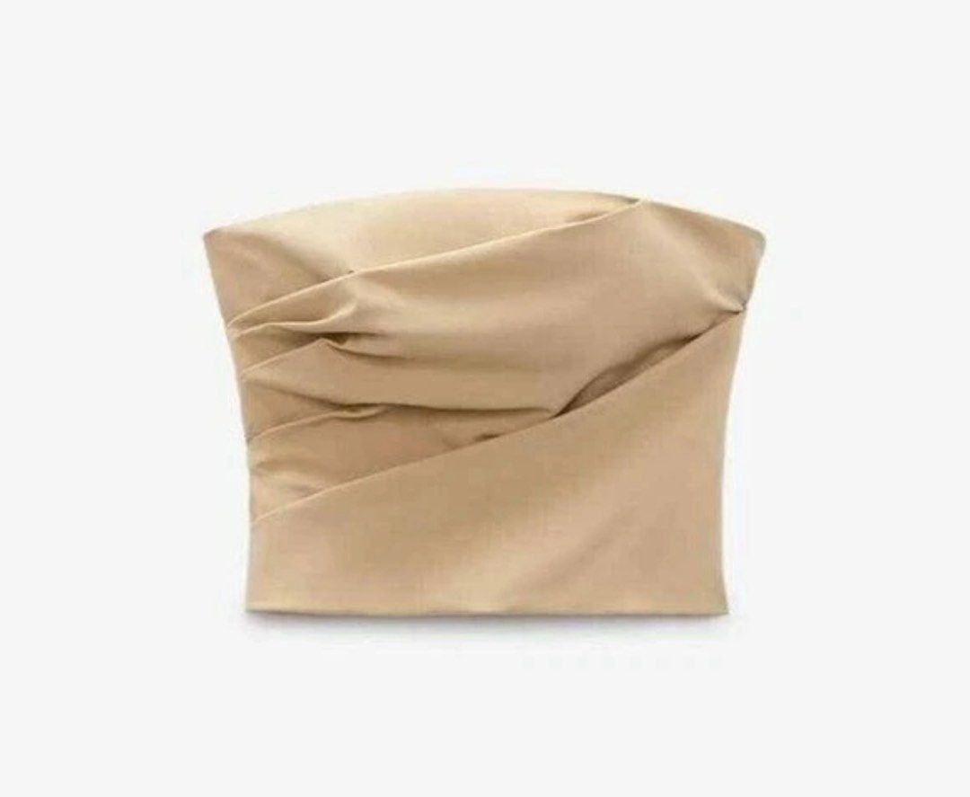 Zara Draped Beige Tube Top (Category: Sleeveless) located in Taguig. Submitted by skinsupplyph (Listing ID 1471079375, Image 2). Description: ZARA Straight Neck Tube Top Size Medium Neutral Beige Brand New without Tags Made in Morocco Authentic Mode of Payment: BPI, BDO, Metrobank, GCash Shipping will be shouldered by the buyer.