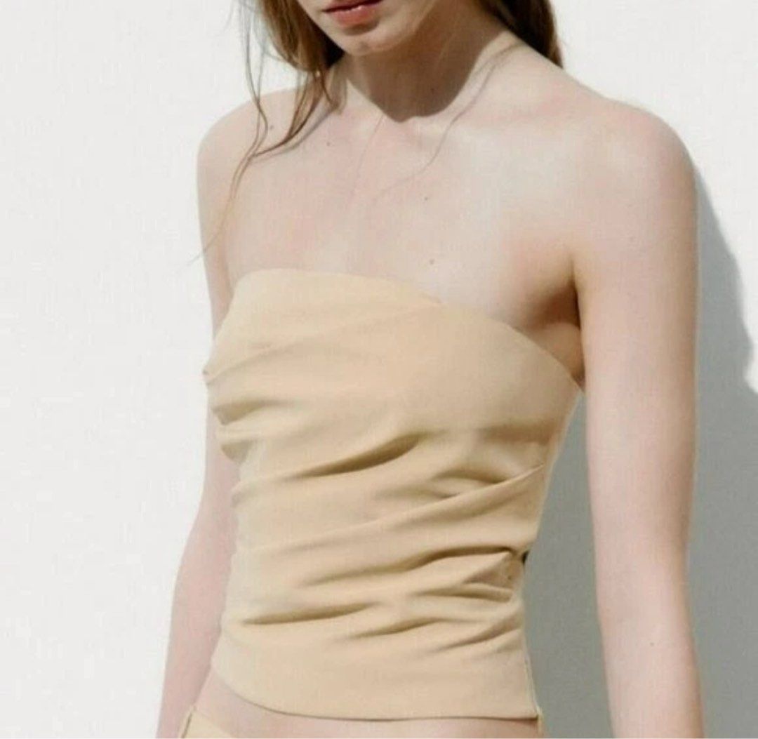 Zara Draped Beige Tube Top (Category: Sleeveless) located in Taguig. Submitted by skinsupplyph (Listing ID 1471079375, Image 3). Description: ZARA Straight Neck Tube Top Size Medium Neutral Beige Brand New without Tags Made in Morocco Authentic Mode of Payment: BPI, BDO, Metrobank, GCash Shipping will be shouldered by the buyer.