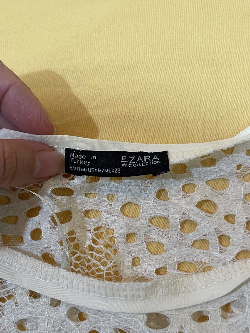 Zara Lace White Top (Category: Sleeveless) located in Bacolod City. Submitted by zdeclutters01 (Listing ID 1470967095, Image 2). Description: Read the description first before asking questions ‼️ * Discounted price exclusive of delivery fees. * Delivery fee c/o Buyer after full payment of the purchase price. PM me for delivery procedure and refund/contingency provisions for your security. * As-is, where-is. Please see photos for defects, if any. 
