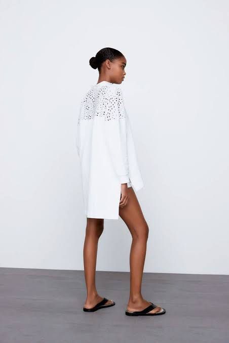 ZARA White Eyelet Cotton Long Back Top L22 (Category: Dresses) located in Manila. Submitted by chloereicapsule (Listing ID 1471097868, Image 2). Description: L-semi XL size, combination of cotton and eyelet fabric, buttons are working, long back, color rate white 9/10 pm for other inquiries .