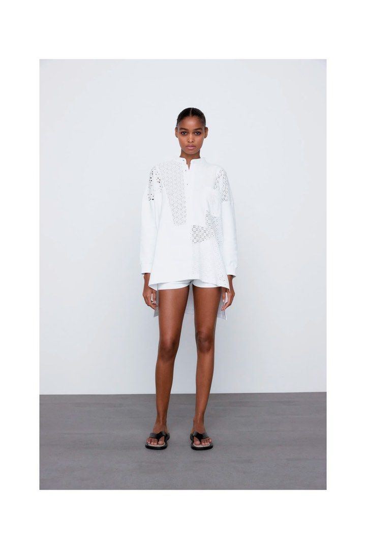 ZARA White Eyelet Cotton Long Back Top L22 (Category: Dresses) located in Manila. Submitted by chloereicapsule (Listing ID 1471097868, Image 1). Description: L-semi XL size, combination of cotton and eyelet fabric, buttons are working, long back, color rate white 9/10 pm for other inquiries .