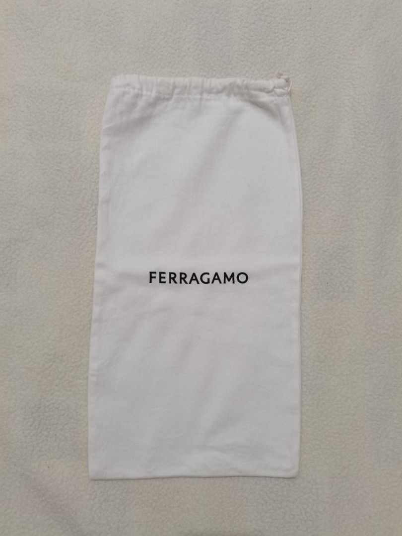 100% authentic Ferragamo boot dust bag (Category: Sneakers & Footwear) located in Santa Cruz. Submitted by oddpenguin-4575 (Listing ID 1465684917, Image 2). Description: 📌.....P L E A S E R E A D..... 📌measurement:L-15.5" /W-8" 📌color-9/10 📌Brand: Ferragamo Type: Boot / Tall Footwear Dust Bag Dimensions: 25.5” L × 8” W Material: Premium Cotton Color: White with Black Logo Text Closure: Top Drawstring Cord Condition: [Insert your item's condit