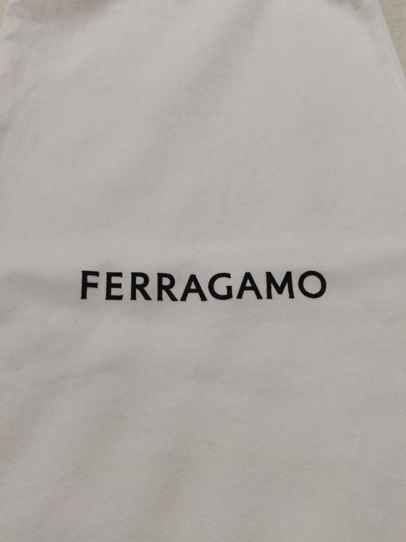 100% authentic Ferragamo boot dust bag (Category: Sneakers & Footwear) located in Santa Cruz. Submitted by oddpenguin-4575 (Listing ID 1465684917, Image 3). Description: 📌.....P L E A S E R E A D..... 📌measurement:L-15.5" /W-8" 📌color-9/10 📌Brand: Ferragamo Type: Boot / Tall Footwear Dust Bag Dimensions: 25.5” L × 8” W Material: Premium Cotton Color: White with Black Logo Text Closure: Top Drawstring Cord Condition: [Insert your item's condit