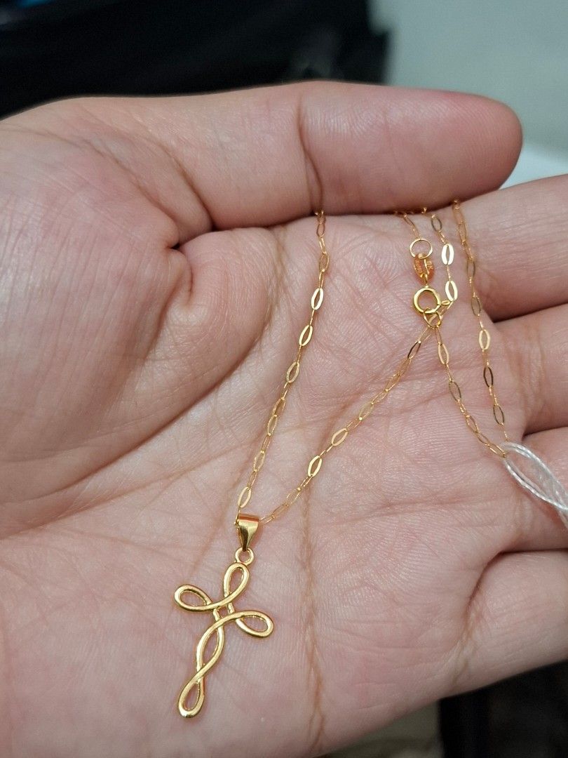 18K gold cross (Category: Necklaces) located in Caloocan City. Submitted by michelle.golveo (Listing ID 1465754979, Image 2). Description: BRAND NEW Size 18" Ang item po na ito ay SOLD PER SET, NOT PER GRAM. Wala po kaming exact or estimated grams na maibibigay dahil set price po ang basis ng selling price, hindi per gram..