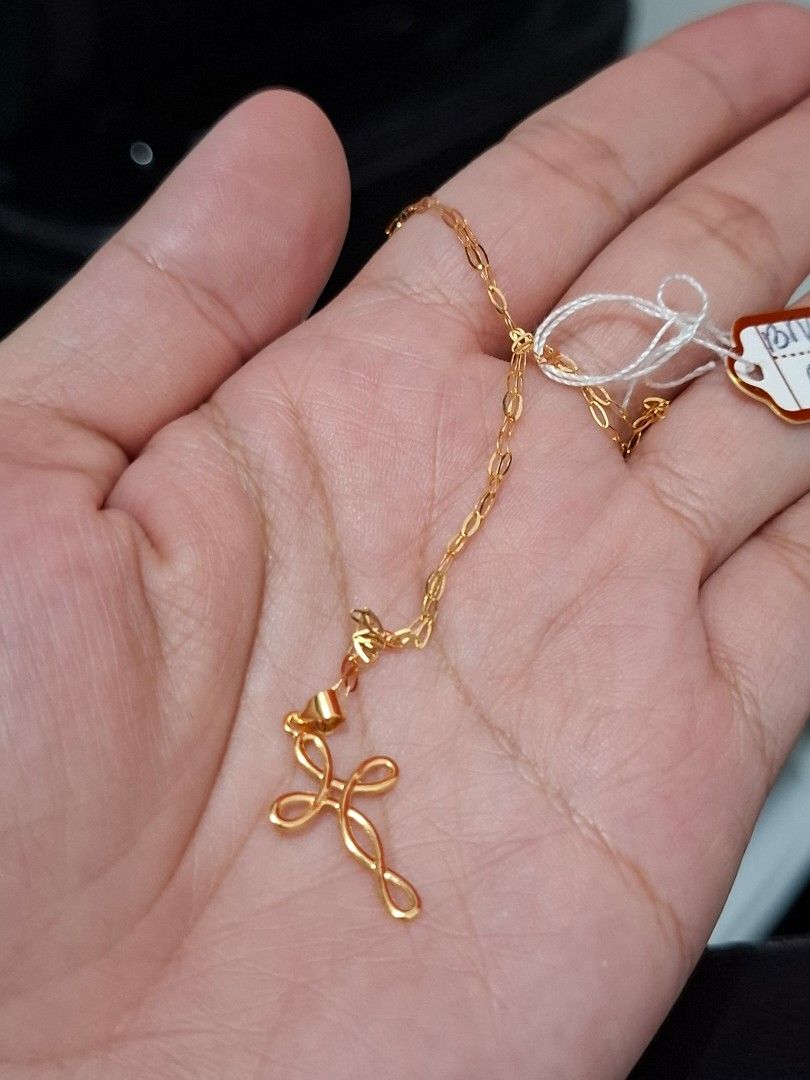 18K gold cross (Category: Necklaces) located in Caloocan City. Submitted by michelle.golveo (Listing ID 1465754979, Image 3). Description: BRAND NEW Size 18" Ang item po na ito ay SOLD PER SET, NOT PER GRAM. Wala po kaming exact or estimated grams na maibibigay dahil set price po ang basis ng selling price, hindi per gram..