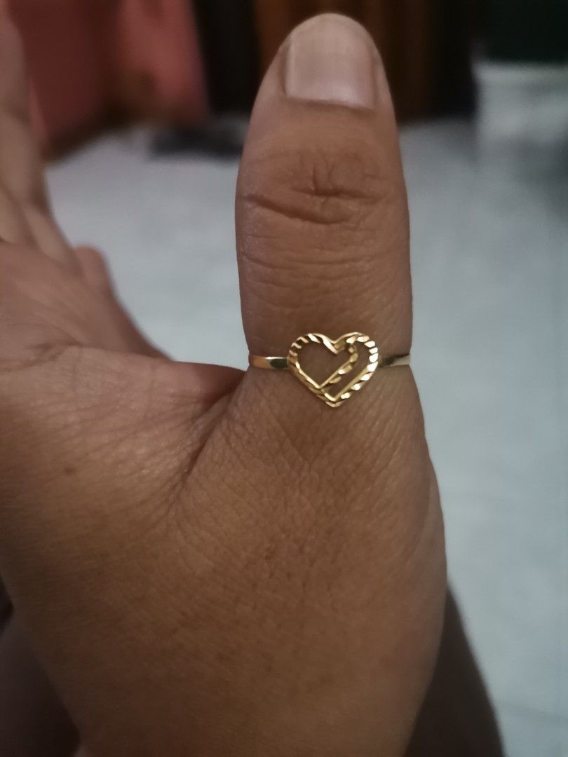 18k Gold Heart Ring Size 9 (Category: Rings) located in Magdalena. Submitted by ckvf032922 (Listing ID 1465691681, Image 1). Description: - Gold ring with a cute cutout heart design and textured detailing - Size: 9 (fits comfortably on fingers or thumbs) - Lightweight and easy to wear for everyday styling - Comes with a bright pink gift box featuring a white cushion - Perfect as a gift or a sweet treat for yourself - hindi lang kasya sa anak ko -