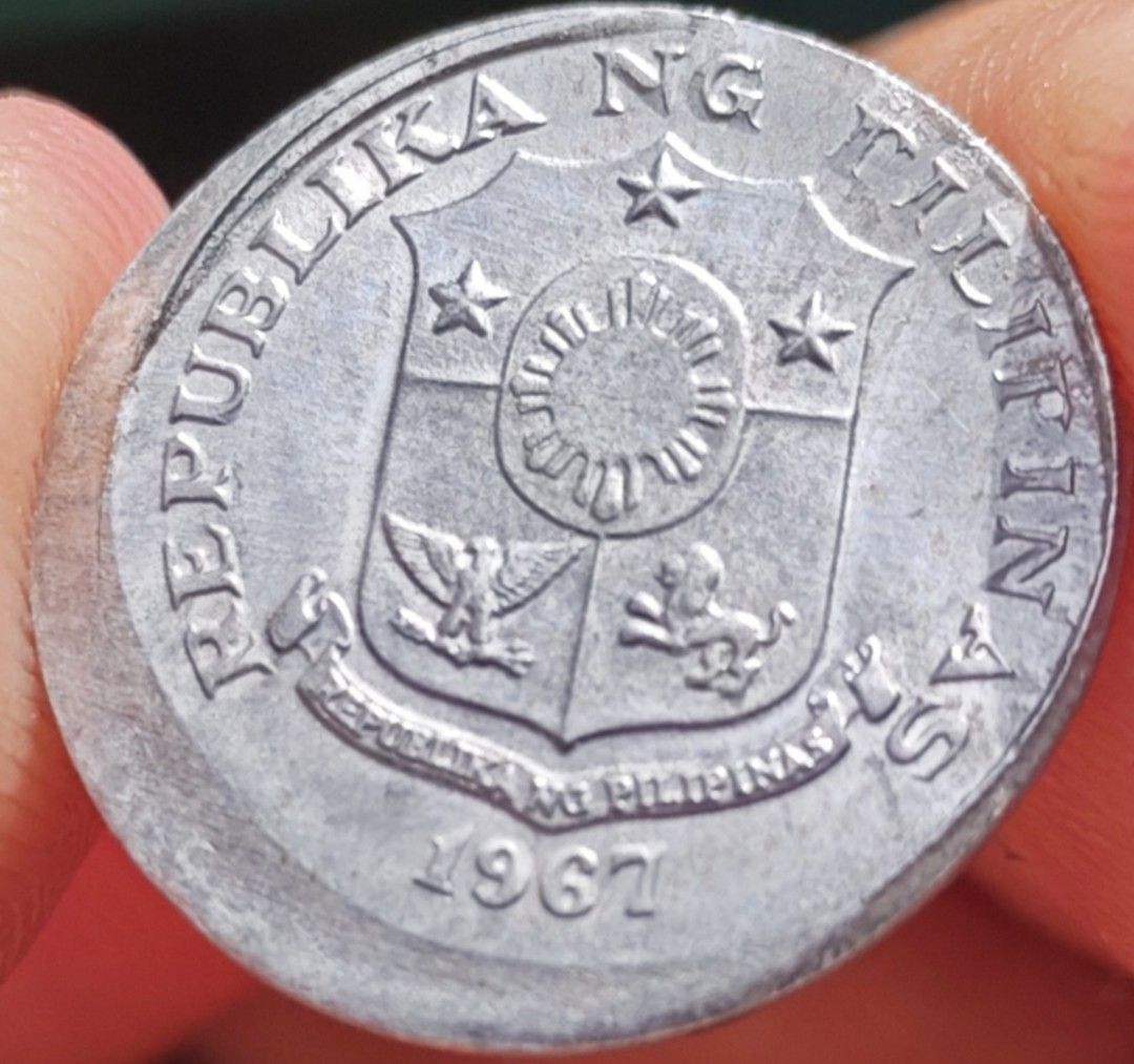 1967 Philippines 1 Sentimo Coin Lapulapu (Category: Currency) located in Paranaque City. Submitted by independentman07 (Listing ID 1465688098, Image 2). Description: - Item: 1967 Philippines One Centimo Coin - Obverse: Lapulapu profile facing left with 'ISANG SENTIMO' - Reverse: Philippine coat of arms with 'REPUBLIKA NG PILIPINAS' - Material: Aluminium-bronze or similar alloy - Condition: Standard circulated vintage coin - Perfect for numismatis