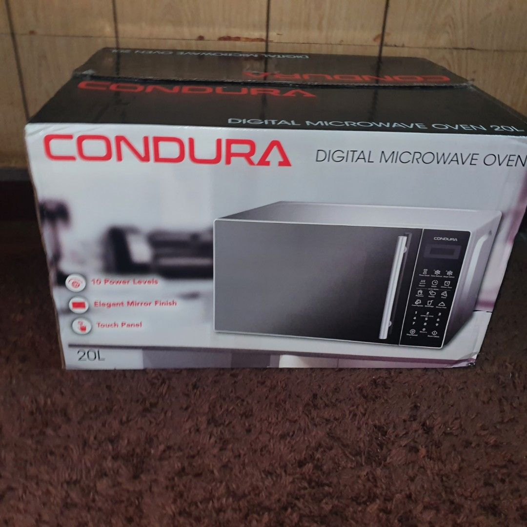 20L Condura digital microwave oven (Category: Craft Supplies & Tools) located in Pasig City. Submitted by fasttech01 (Listing ID 1465581470, Image 1). Description: .