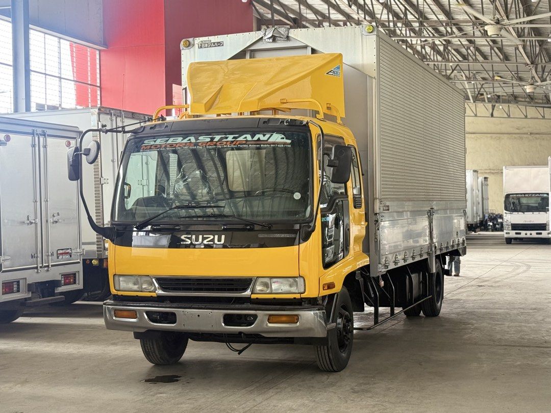 21ft Isuzu Forward Wingvan 6HH1 inline engine (Category: Heavy Vehicles) located in Bulacan. Submitted by arvin_custodio (Listing ID 1465630988, Image 1). Description: Isuzu Forward Wingvan 21ft 6HH1 inline engine 6wheeler big tires Complete papers Ready to pullout Call: 0919-096-9833.