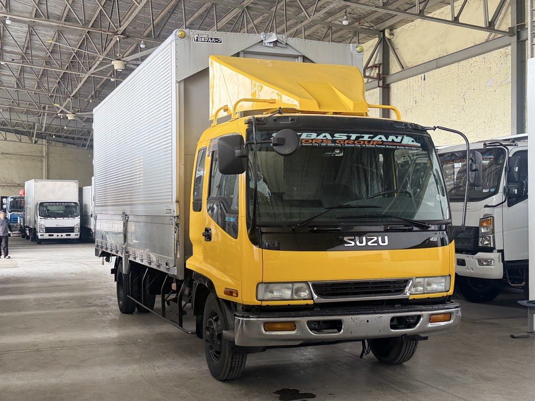 21ft Isuzu Forward Wingvan 6HH1 inline engine (Category: Heavy Vehicles) located in Bulacan. Submitted by arvin_custodio (Listing ID 1465630988, Image 2). Description: Isuzu Forward Wingvan 21ft 6HH1 inline engine 6wheeler big tires Complete papers Ready to pullout Call: 0919-096-9833.