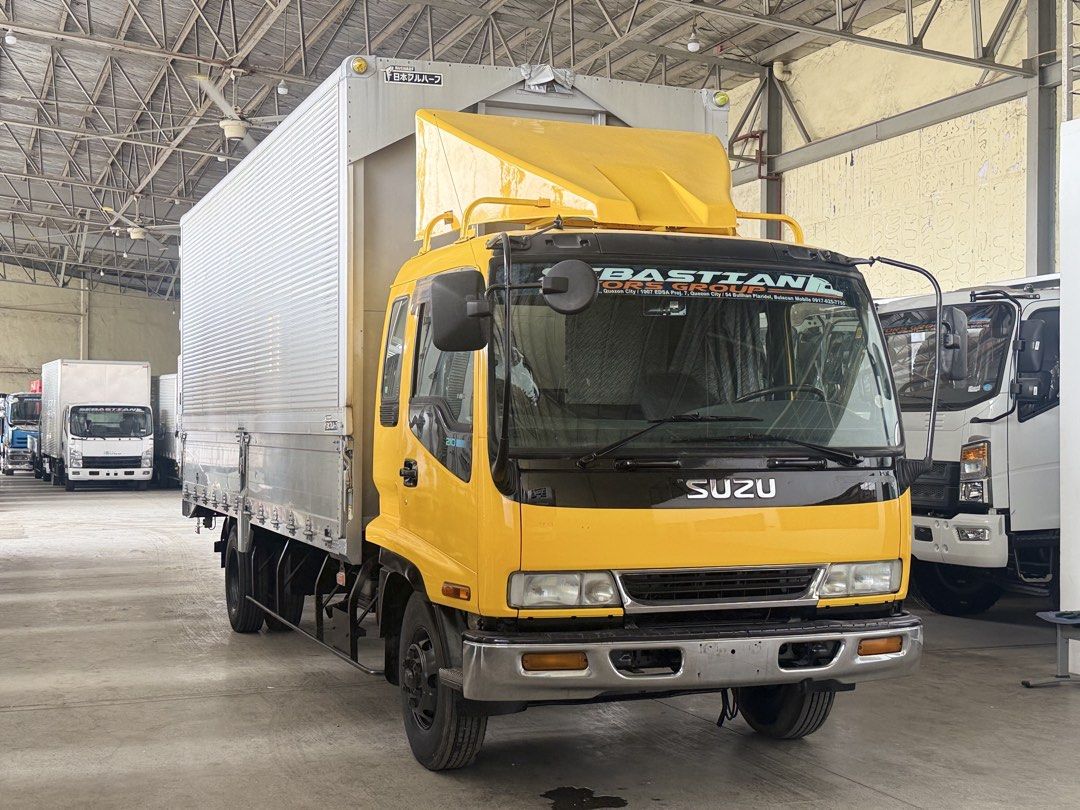 21ft Isuzu Forward Wingvan 6HH1 inline engine (Category: Heavy Vehicles) located in Bulacan. Submitted by arvin_custodio (Listing ID 1465630988, Image 3). Description: Isuzu Forward Wingvan 21ft 6HH1 inline engine 6wheeler big tires Complete papers Ready to pullout Call: 0919-096-9833.