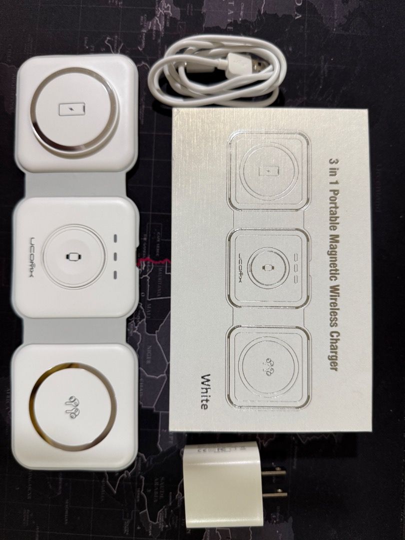 3 in 1 portable wireless charger for Apple devices (Category: Chargers & Cables) located in Mandaue City. Submitted by skv369 (Listing ID 1465710940, Image 1). Description: 3 in 1 Portable compact Magnetic Wireless charger that can charge Cell iphone, apple watch and airpods. With charging cord. Compatible only with Apple products..