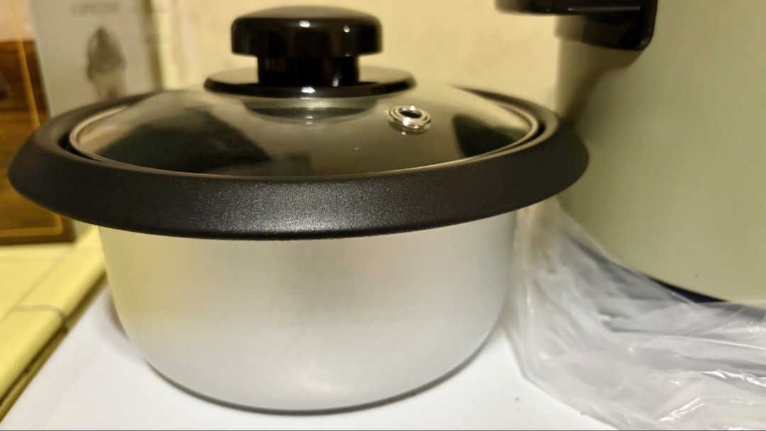 41 & Main 3 Cup Rice Cooker (Category: Cookers) located in Manila. Submitted by lizziedear.lizziedear (Listing ID 1465640968, Image 3). Description: - Brand: 41 & Main - Capacity: Compact 3-cup size, ideal for singles or small households - Color: Aesthetic cream-colored exterior with black accents and glass lid - Features: Easy cook and warm modes with clear indicator lights - Inclusions: Comes with a measuring cup, rice paddle, and original box 