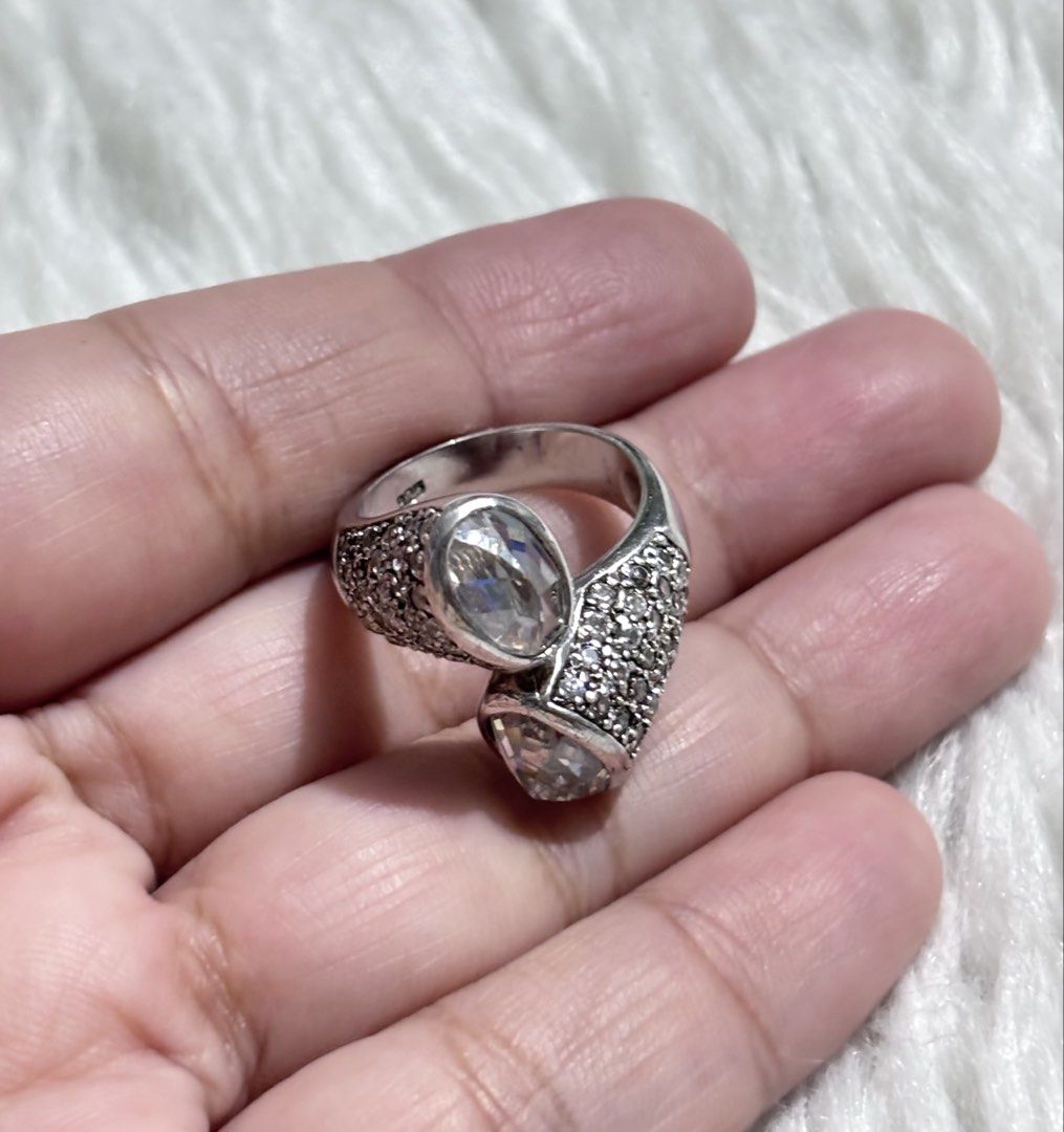 925 Silver Bypass-style ring size 6 (Category: Rings) located in Paranaque City. Submitted by dalle_closet (Listing ID 1465704657, Image 1). Description: size 6 solid silver ang nice. complete stones.
