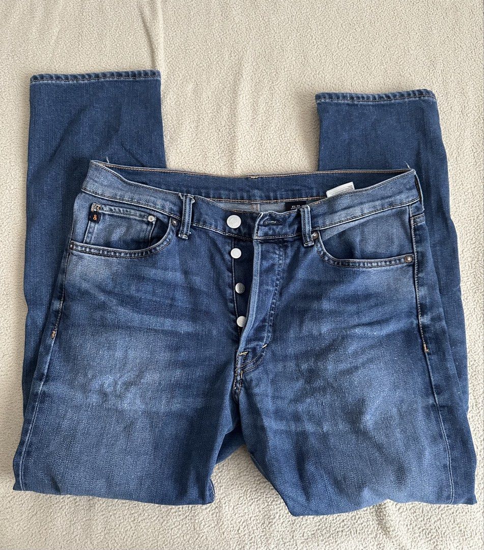 & Denim Slim Straight Jeans Size 33/30 (Category: Jeans) located in Paranaque City. Submitted by kasheeko (Listing ID 1465620554, Image 1). Description: - Style: Slim straight jeans - Color: Blue with soft thigh fading - Size: 33 waist, 30 length - Material: Comfortable cotton blend - Closure: Button fly with metallic buttons - Details: Classic five-pocket design, clean back pockets, sturdy belt loops - Origin: Made in Bangladesh.