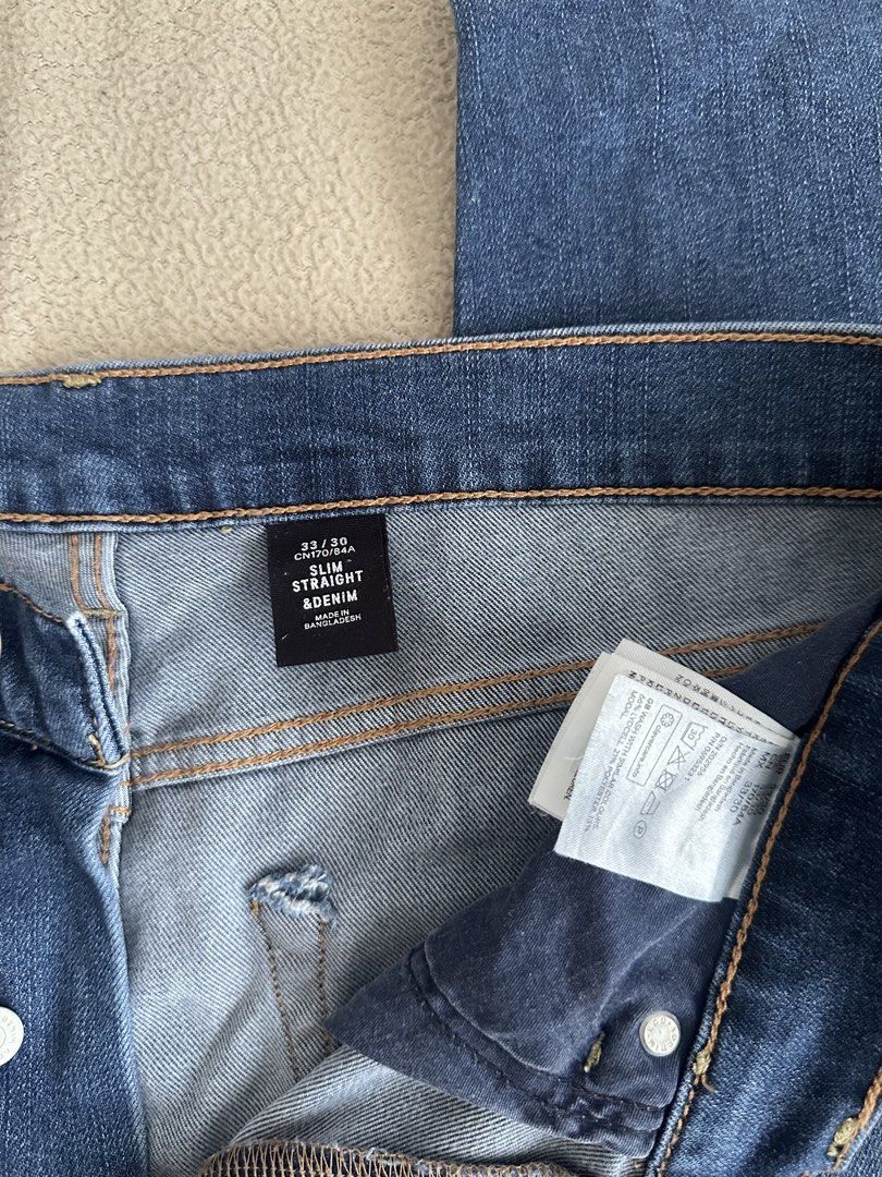 & Denim Slim Straight Jeans Size 33/30 (Category: Jeans) located in Paranaque City. Submitted by kasheeko (Listing ID 1465620554, Image 2). Description: - Style: Slim straight jeans - Color: Blue with soft thigh fading - Size: 33 waist, 30 length - Material: Comfortable cotton blend - Closure: Button fly with metallic buttons - Details: Classic five-pocket design, clean back pockets, sturdy belt loops - Origin: Made in Bangladesh.