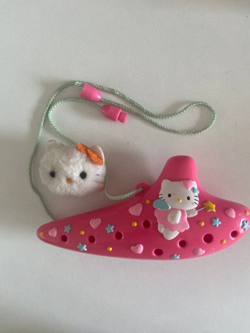[ Set ] Hello Kitty Ocarina and Small Charm (Category: Musical Instruments) located in Makati City. Submitted by mezz0piano (Listing ID 1465734253, Image 1). Description: • With etiketa and sanrio markings Mop: Gcash | Mod: J&T, Lalamove 📌 Makati.