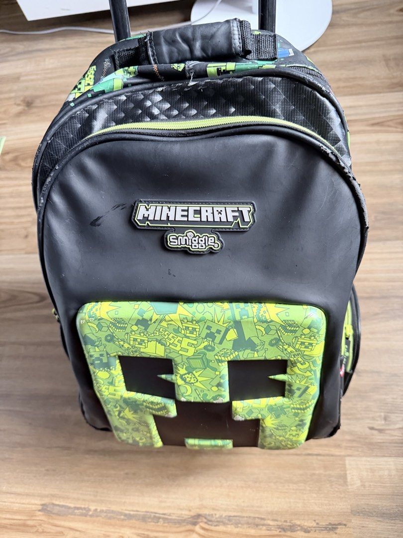 🎒 Smiggle x Minecraft Creeper Trolley Backpack with Light-Up Wheels (Category: Backpacks) located in Paranaque City. Submitted by saveurdelalumiere (Listing ID 1465653356, Image 1). Description: Awesome 2-in-1 trolley bag and backpack from the official Smiggle x Minecraft collaboration! Features a 3D Creeper design, multiple zipped compartments, retractable handle, and motion-activated light-up wheels. Brand: Smiggle x Minecraft Features: Motion