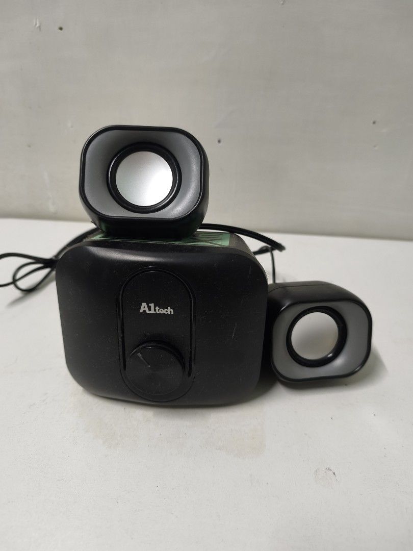 A1tech 2.1 Computer Speaker System (Category: Soundbars, Speakers & Amplifiers) located in San Jose del Monte. Submitted by missalipot (Listing ID 1465746420, Image 1). Description: - Brand/Model: A1tech 2.1 Speaker System - Inclusions: 1 main subwoofer (with front volume dial) and 2 satellite speakers - Setup: Compact black design, ideal for desktop use - Connectivity: Wired connection attached - Condition: Tested and working 100%, with minor du