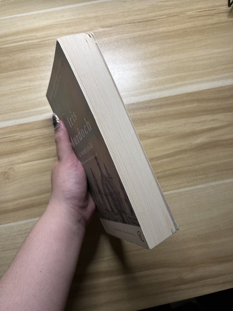 A Word Child by Iris Murdoch (Category: Storybooks) located in Quezon City. Submitted by ekrudieter (Listing ID 1465618123, Image 2). Description: - Title: A Word Child by Iris Murdoch - Edition: Vintage Classics Paperback with introduction by Ray Monk - ISBN: 978-0-099-42912-8 - Cover: Features All Souls College, Oxford artwork - Condition: Clean inside pages, excellent reading copy - Perfect for literature fans and book collectors.