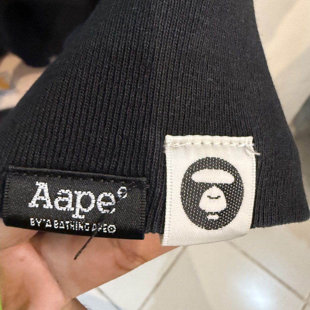 Aape By A Bathing Ape Black Long Sleeve Tee (Category: Tshirts & Polo Shirts ) located in Manila. Submitted by carbungcoalex (Listing ID 1465742477, Image 3). Description: AAPE SLEEVE SCRIPT BLACK LONGSLEEVE 20 by 26.5 Good Condition Complete tags 1500 CLAIM.