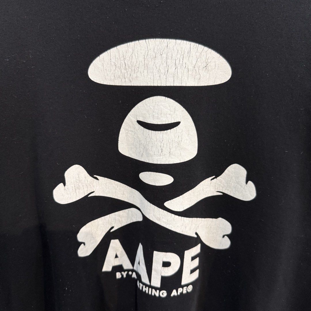 AAPE By A Bathing Ape Black Sweatshirt (Category: Coats, Jackets and Outerwear) located in Manila. Submitted by carbungcoalex (Listing ID 1465742036, Image 2). Description: AAPE BIG LOGO BLACK SWEATSHIRT 23 by 27.5 Good Condition Complete tags Hairlines/crack prints/Lints 1200 CLAIM.