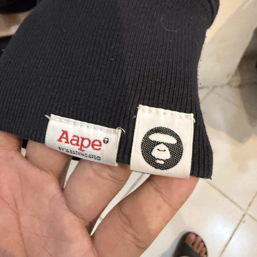 AAPE By A Bathing Ape Black Sweatshirt (Category: Coats, Jackets and Outerwear) located in Manila. Submitted by carbungcoalex (Listing ID 1465742036, Image 3). Description: AAPE BIG LOGO BLACK SWEATSHIRT 23 by 27.5 Good Condition Complete tags Hairlines/crack prints/Lints 1200 CLAIM.