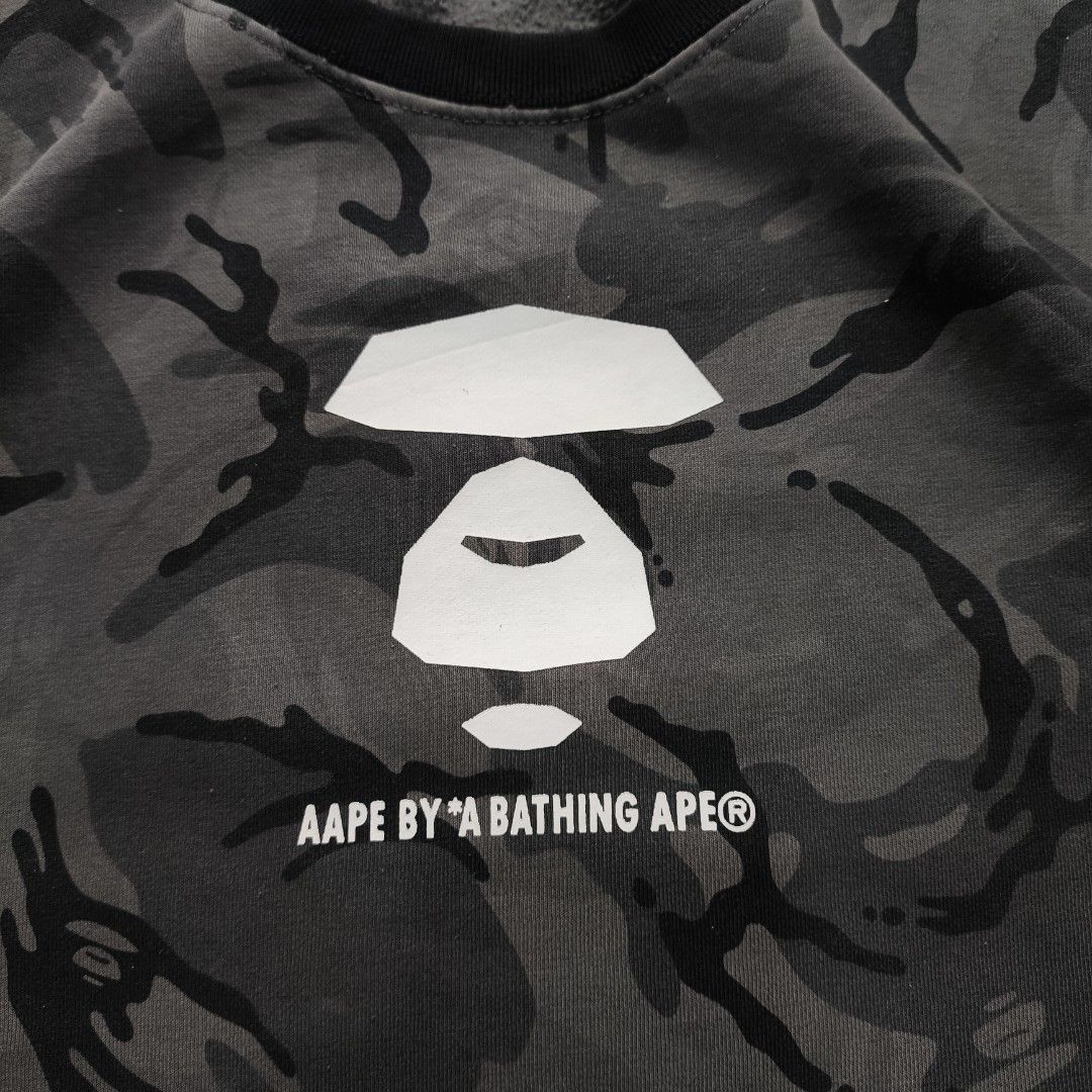 Aape Camouflage Sweater (Category: Hoodies) located in Manila. Submitted by shykes_26 (Listing ID 1465717452, Image 3). Description: Dimensions Width - 22.5 Length - 30 Size on tag - 4xl (large fittings) Issues - cut washtags.