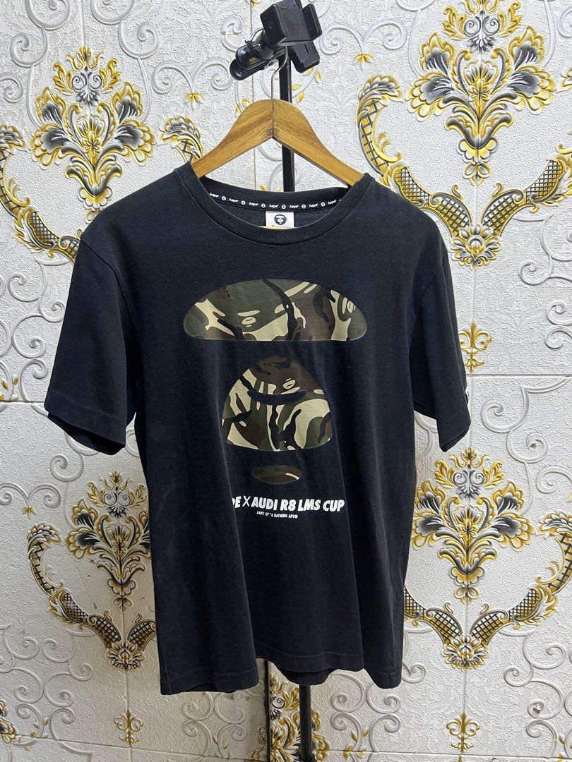 AAPE x Audi R8 LMS Cup Camo Tee (Category: Tshirts & Polo Shirts ) located in Manila. Submitted by irenekaren57943 (Listing ID 1465628679, Image 1). Description: 𒊹︎𝐀𝐀𝐏𝐄 𝐒𝐡𝐢𝐫𝐭 ➤ 𝟐𝟏.𝟓 𝐖 | 𝟐𝟖.𝟓 𝐋 ➤ 𝟗.𝟓 | 𝐄𝐱𝐜𝐞𝐥𝐥𝐞𝐧𝐭 ➤ 𝐍𝐨 𝐈𝐬𝐬𝐮𝐞 ➤ 𝐍𝐞𝐞𝐝 𝐖𝐚𝐬𝐡 𝐎𝐧𝐥𝐲 .
