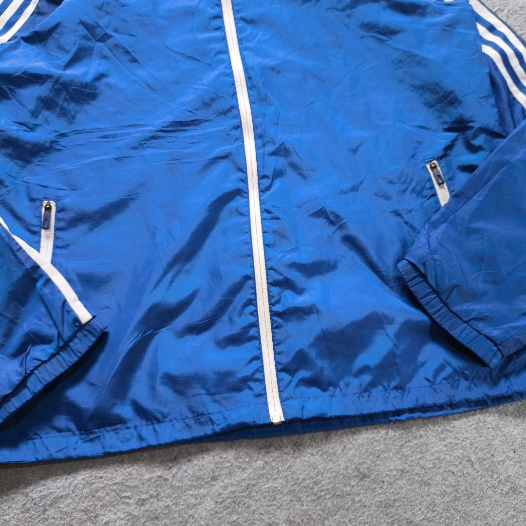 Adidas 3 Lines Windbreaker (Category: Activewear) located in Manila. Submitted by shykes_26 (Listing ID 1465718924, Image 3). Description: Dimensions Width - 22.5 Length - 28 Size on tag - L Issues - None.