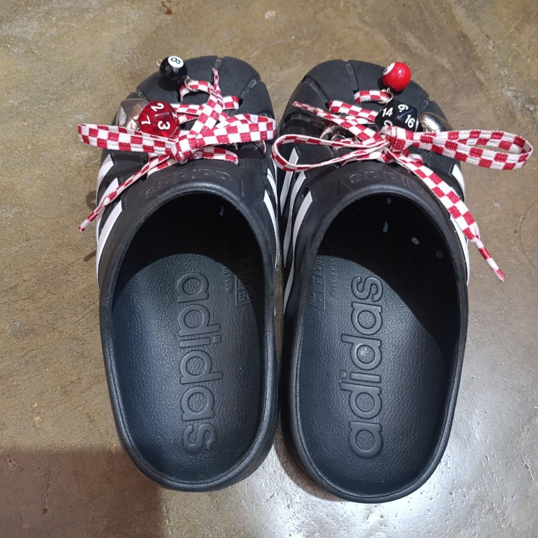 Adidas Adiletta Clogs Black Crocs (Category: Slippers and slides) located in Abucay. Submitted by stripesandcheck (Listing ID 1465610780, Image 3). Description: 🔖Authentic Adidas Adiletta Clog with customized lace and charms 📌Please manage your expectations, this is a used item. No return no exchange.