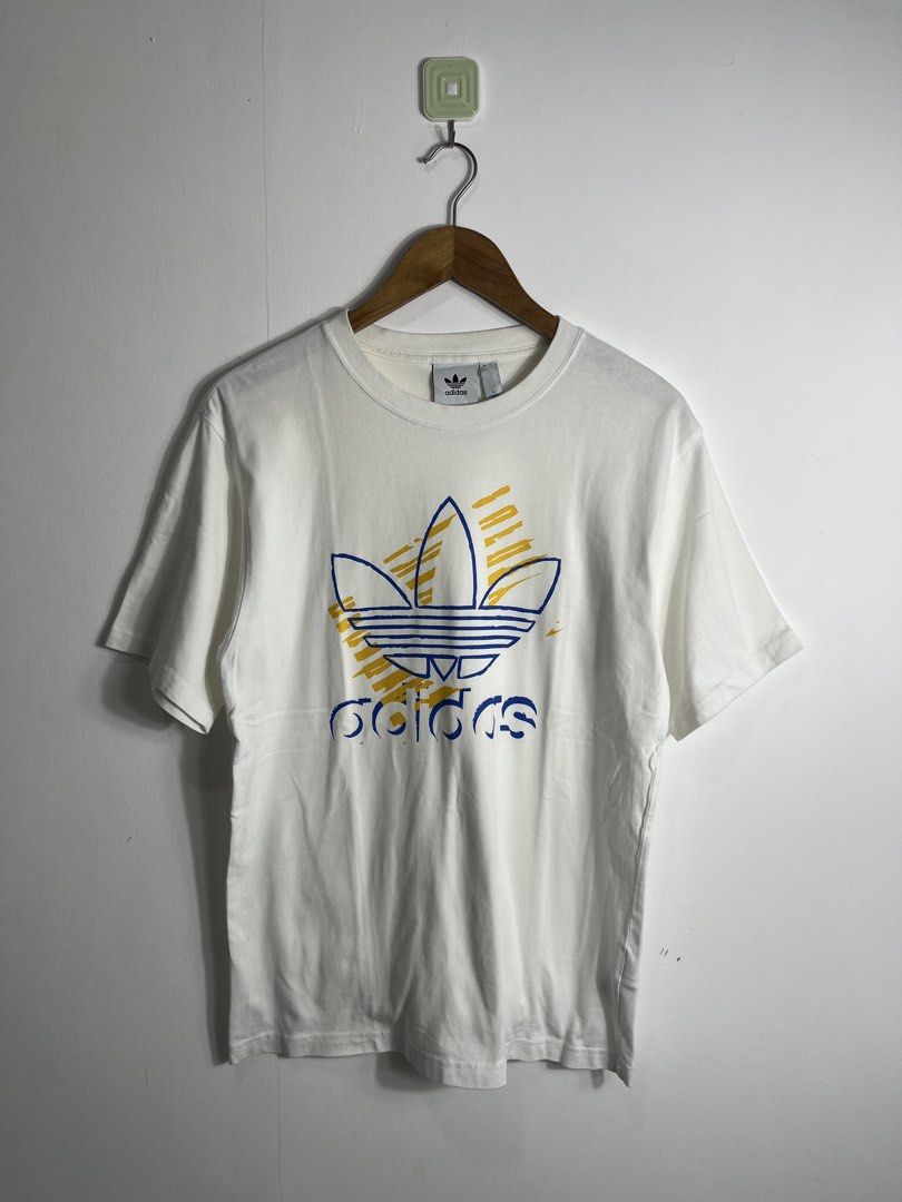 Adidas Biglogo White Shirt Medium (Category: Tshirts & Polo Shirts ) located in Nasugbu. Submitted by janstuffs.ph (Listing ID 1465589314, Image 1). Description: Adidas White Graphic Shirt Authentic 💯 Size on tag: SMALL Dimension: 19.5"W x 27"L Best fit: MEDIUM Condition: 10/10 Good as New Flaw: None Mine: 580 Thankyou po 🫶💕.