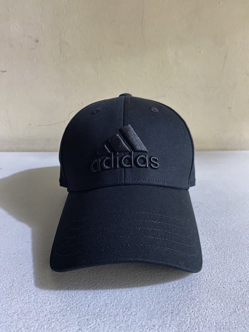 Adidas Black Cap 1k ( Decluttering ) (Category: Caps & Hats) located in Quezon City. Submitted by joelds (Listing ID 1465636577, Image 1). Description: - Brand: Adidas - Color: Classic Black - Design: Embroidered logo on the front - Fit: Adjustable strap with metal buckle (fits most head sizes) - Style: Curved brim, solid stitching throughout - Condition: Excellent / Ready to wear.