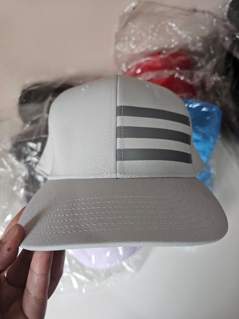 ADIDAS Cap - Gray (Category: Caps & Hats) located in Quezon City. Submitted by senyoramaria2 (Listing ID 1465630491, Image 1). Description: ADIDAS Cap OSFM #USpasabuy.