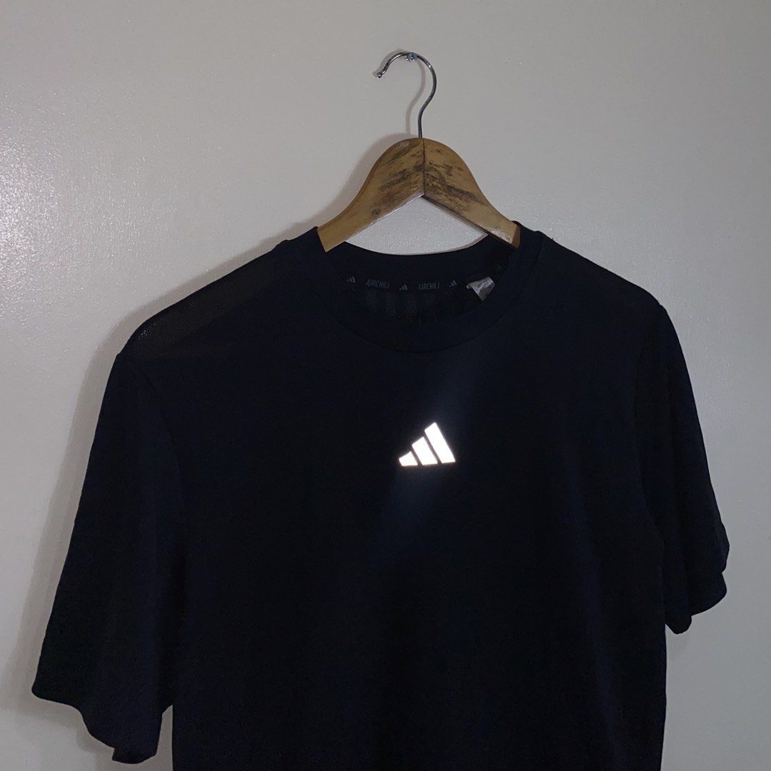 Adidas HIIT Aurchill Tee Dark Navy Size L (Category: Activewear) located in Cebu City. Submitted by theloose.thread (Listing ID 1465754213, Image 2). Description: - Brand: Adidas Aurchill training t-shirt - Color: Dark navy with a reflective chest logo for low-light visibility - Material: Lightweight, breathable blend of 63% recycled polyester and 37% acetate - Design: Crew neck, short sleeves - Size: Asia A/L (180/100A, AU/NZ L, J: XL) - Origin: