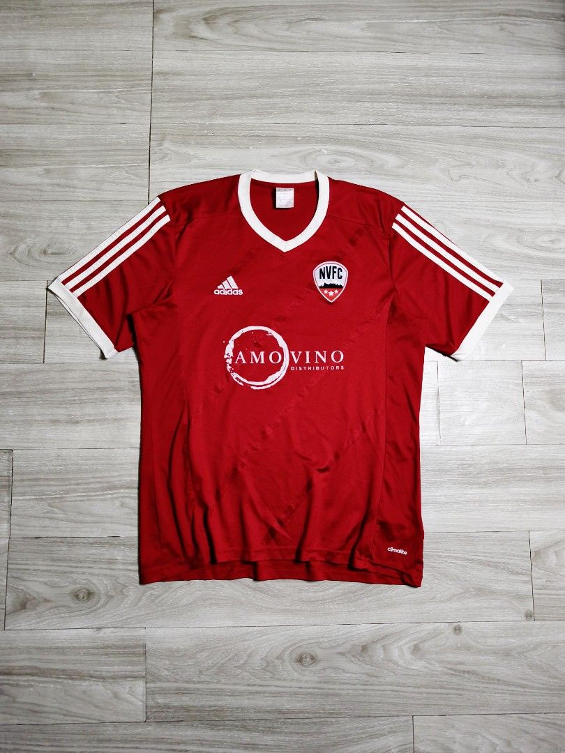 Adidas NVFC Football Jersey (Category: Activewear) located in Paranaque City. Submitted by pickersform (Listing ID 1465704542, Image 1). Description: - Adidas NVFC Jersey - Size: Medium-Large dimes 22x29 - Details: NVFC chest crest, Amo Vino Distributors sponsor logo, and number 9 on the back - Material: Climalite fabric for moisture management - embroidered logos minor crack on white print and minor lints only unnoticeable .