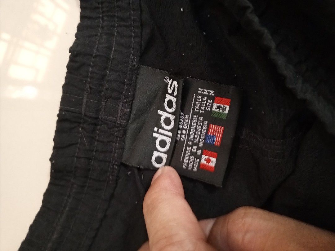 Adidas Nylon Shorts Black White Size M (Category: Shorts) located in Orani. Submitted by thriftniea (Listing ID 1465647706, Image 3). Description: ADIDAS SIZE 38-40 LENGTH 19.