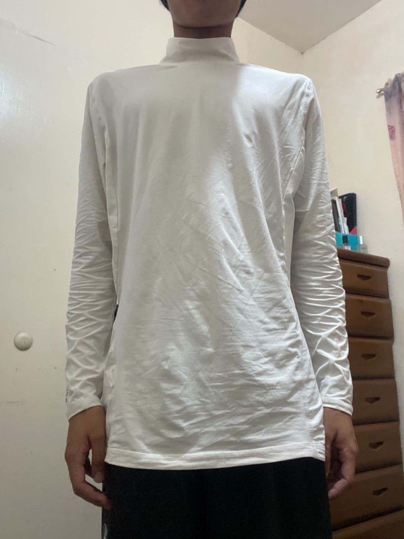 Adidas Techfit ClimaCool Long Sleeve White Compression Shirt (Category: Activewear) located in Manila. Submitted by tiyofindz (Listing ID 1465666723, Image 2). Description: THRIFTED!! - Brand: Adidas - Style: Techfit Long Sleeve Compression Top - Color: White/Dirty White (color rate: 8.5/10) - Technology: ClimaCool for breathability and moisture management - Design: Mock neck with signature branding on collar and lower sleeve MODEL REFERENCE: 5'7