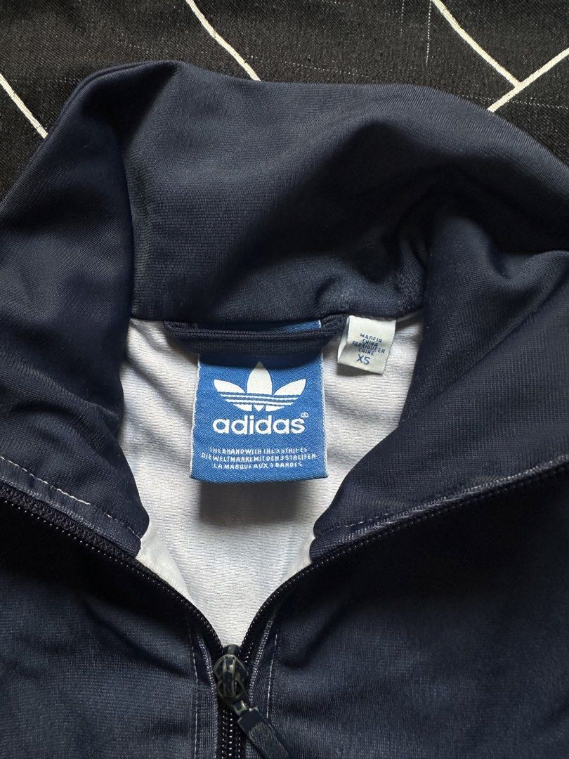 ADIDAS Track Jacket Blue Striped Activewear (Category: Coats, Jackets and Outerwear) located in Las Pinas. Submitted by jananavarr15760 (Listing ID 1465646909, Image 3). Description: ADIDAS Track Jacket Blue Striped Activewear Price: ₱1,000 Size: XS Length - 25 inch Width - 20 inch.
