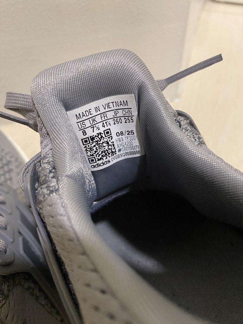 Adidas Ultra Boost (almost new) (Category: Sneakers) located in Muntinlupa City. Submitted by georgette95 (Listing ID 1465683690, Image 3). Description: - Brand: Adidas Ultra Boost - Color: Grey with white soles and black rubber outsoles - Size: US 8 / UK 7.5 - Material: Breathable Primeknit upper with signature side cage - Condition: Clean, very minimal wear on treads - Ideal for: Daily casual wear or gym workouts - Location: Metro Manila (Shipp