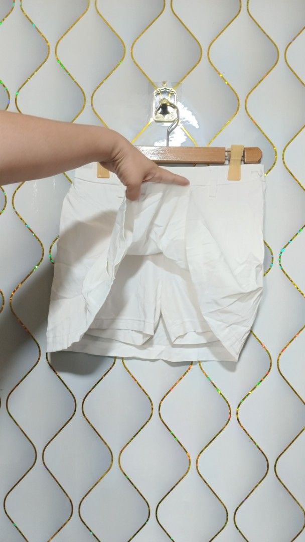 Adidas White Pleated Skort (Category: Skirts) located in Manila. Submitted by zariyah.1986 (Listing ID 1465625779, Image 3). Description: - Brand: Adidas - Item: White pleated skort with built-in shorts - Size: S (Waist: 27×14) - Details: Back pockets with embroidered Adidas logo, made in China - Versatile: Great for sports, workouts, or casual everyday outfits - Condition: Excellent.