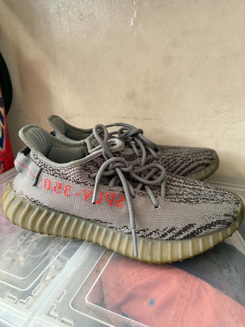 Adidas Yeezy Boost 350 V2 (Category: Sneakers) located in Manila. Submitted by penaflorlo52034 (Listing ID 1465621690, Image 1). Description: - Model: Adidas Yeezy Boost 350 V2 - Colorways Available: Grey Beluga 8.5 and White Static 9 - Upper: Breathable Primeknit with distinct lateral stripe and SPLY-350 branding - Sole: Cushioned ribbed rubber outsole with Boost technology - Closure: Lace-up fastening - Style: Ultimate comfortable everyday stre