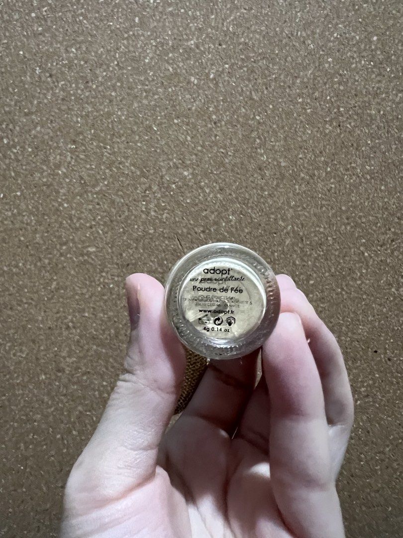 Adopt Shimmering Glitter Powder (Category: Fragrance & Deodorants) located in Quezon City. Submitted by miyakieee (Listing ID 1465754329, Image 2). Description: Adopt Poudre de Fée Body Shimmer Powder - Vintage-style glass bottle with a golden pump atomizer - Net Weight: 4g (Made in France) - used once only - subtle glow on your skin (can be used on the face, body, or hair!) not chunky glitters.