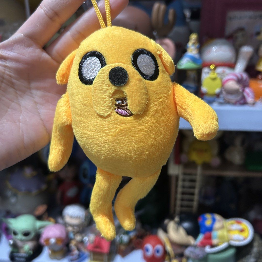 Adventure Time Jake Plush Charm (Category: Plushies & Soft Toys) located in Quezon City. Submitted by kitsune.treasures (Listing ID 1465596275, Image 1). Description: *First to pay policy! *1 day reservation only. Failure to pay on time, auto cancel. 📍Quezon City * MOD: J&T | Lalamove * MOP: GCASH | BPI 📦ON HAND AND READY TO SHIP! CONDITION: WHAT YOU SEE IS WHAT YOU GET. Dimensions: Kindly check the photos for the actual measurements. Please ch