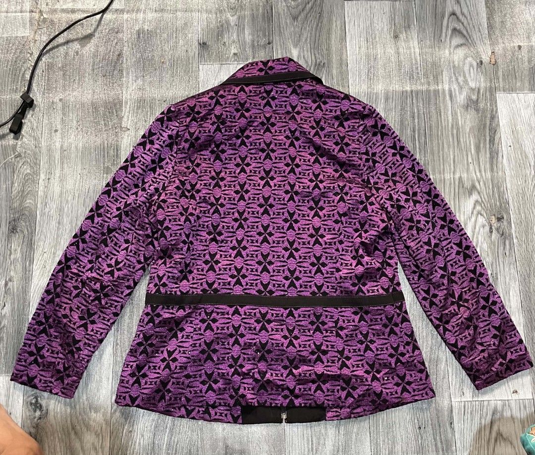 AGORA Purple Patterned Jacket with Rhinestones (Category: Coats, Jackets and Outerwear) located in Cagayan de Oro. Submitted by rhyrhyrhys (Listing ID 1465607681, Image 3). Description: - Brand: AGORA - Design: Purple and black patterned fabric with eye-catching rhinestone detailing on the zipper, collar, and pockets - Features: Full zip front, structured collar, two functional front pockets, and a fully lined interior - Size: Tag reads 91-96-160