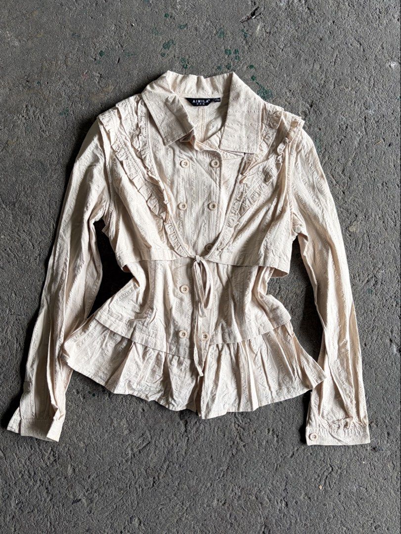 AIMILA Beige Ruffled Double-Breasted Long Sleeve Blouse (Category: Blouses) located in Quezon City. Submitted by ward.drobe (Listing ID 1465639330, Image 1). Description: Size M-L.