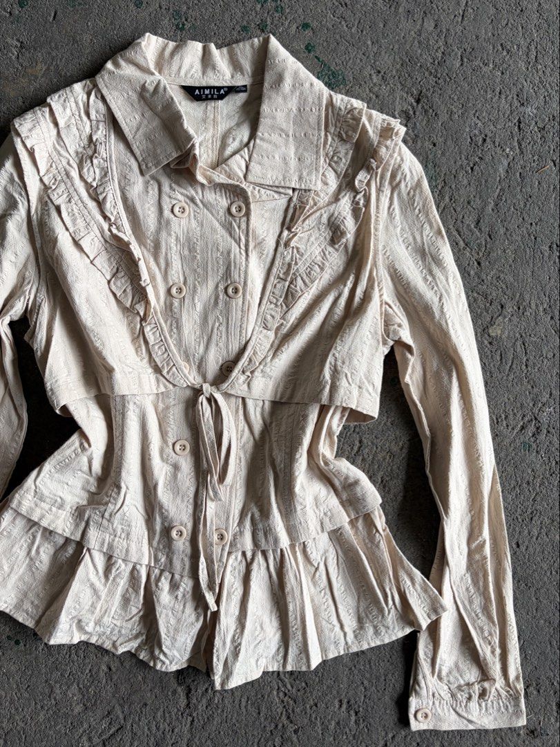 AIMILA Beige Ruffled Double-Breasted Long Sleeve Blouse (Category: Blouses) located in Quezon City. Submitted by ward.drobe (Listing ID 1465639330, Image 2). Description: Size M-L.